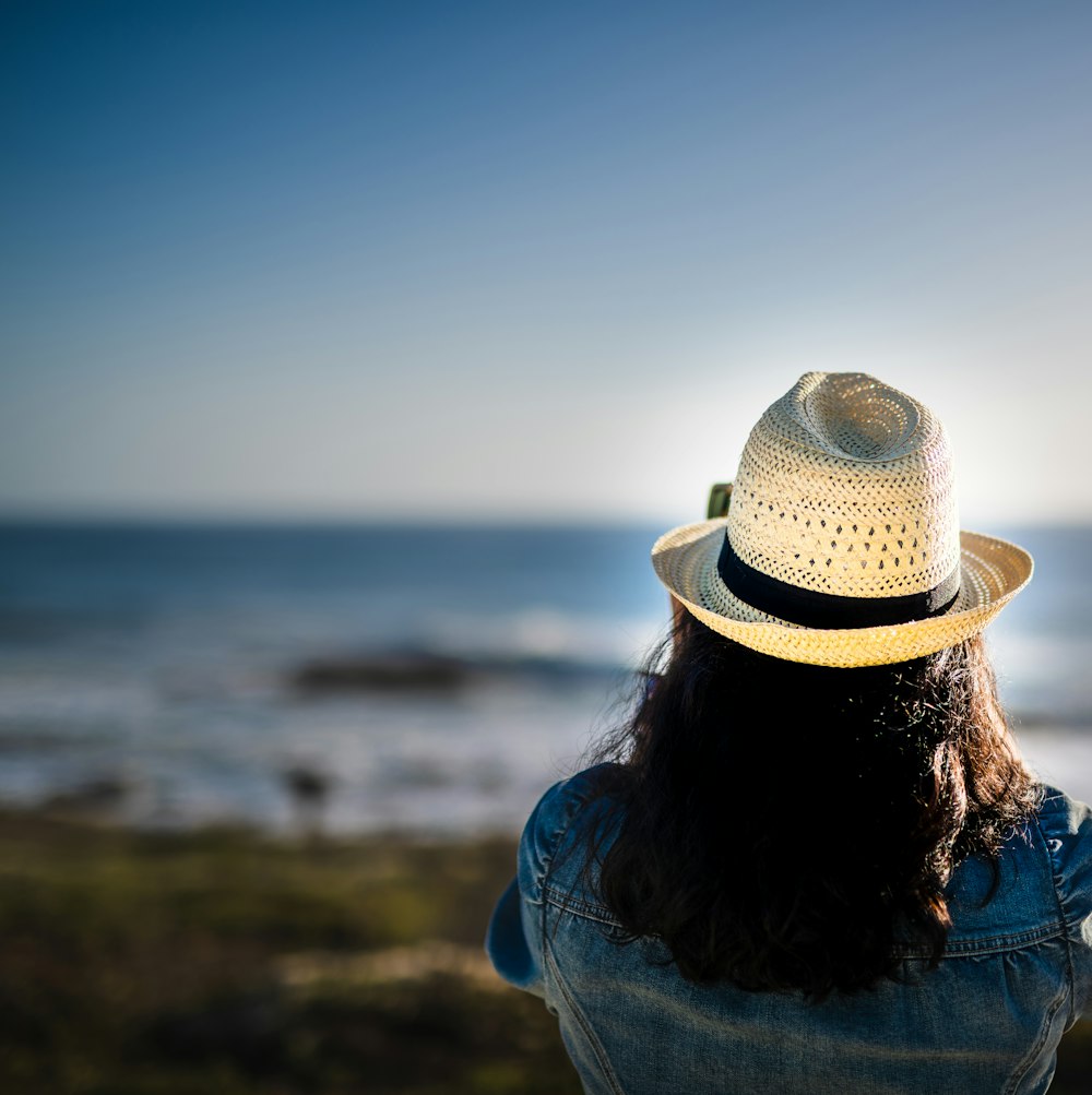 woman standing under white sky during daytime