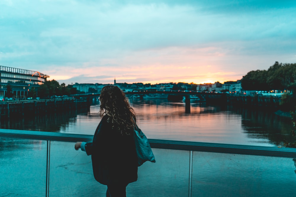 woman wearing black jacket during daytime