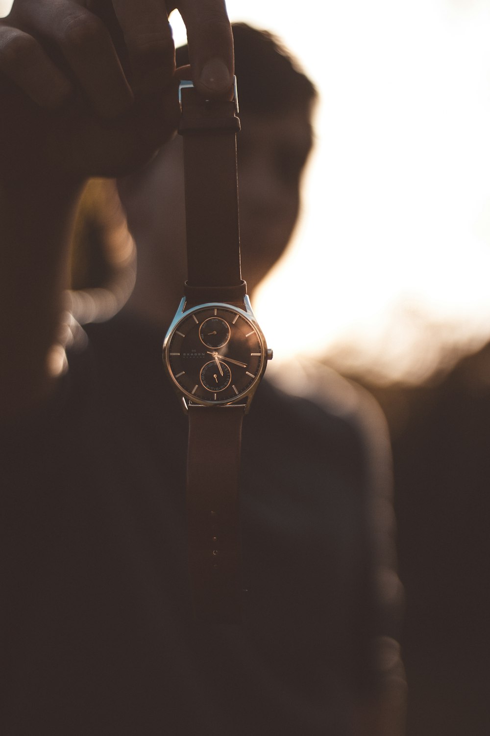 round silver-colored watch