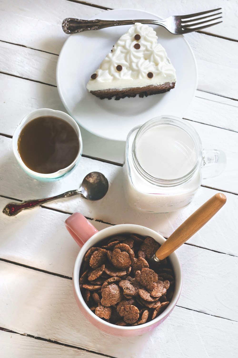 cereal beside slice of cake on plate