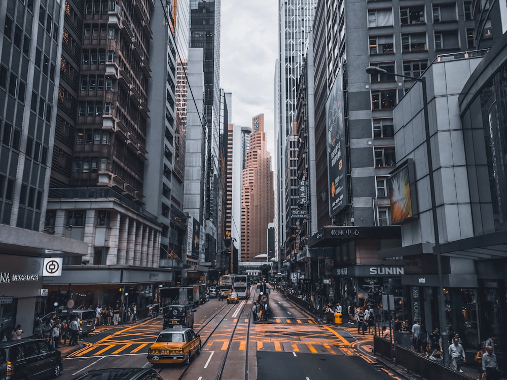 selective-color photography of taxi car