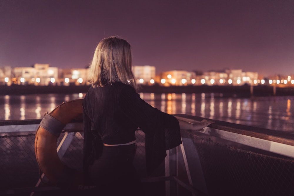 woman leaning on the bar