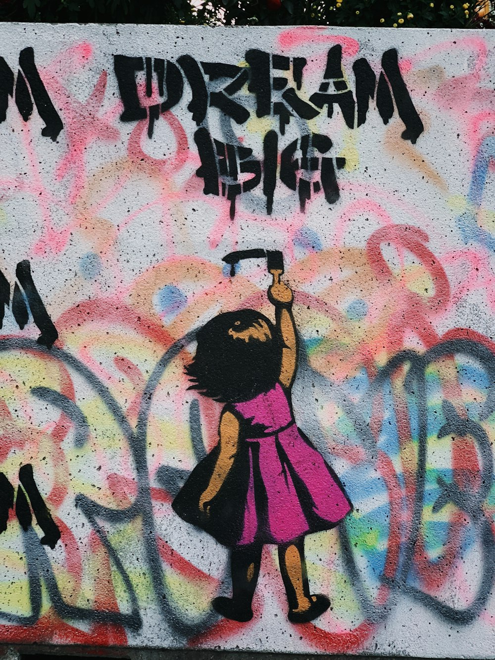 girl writing on wall graffiti art