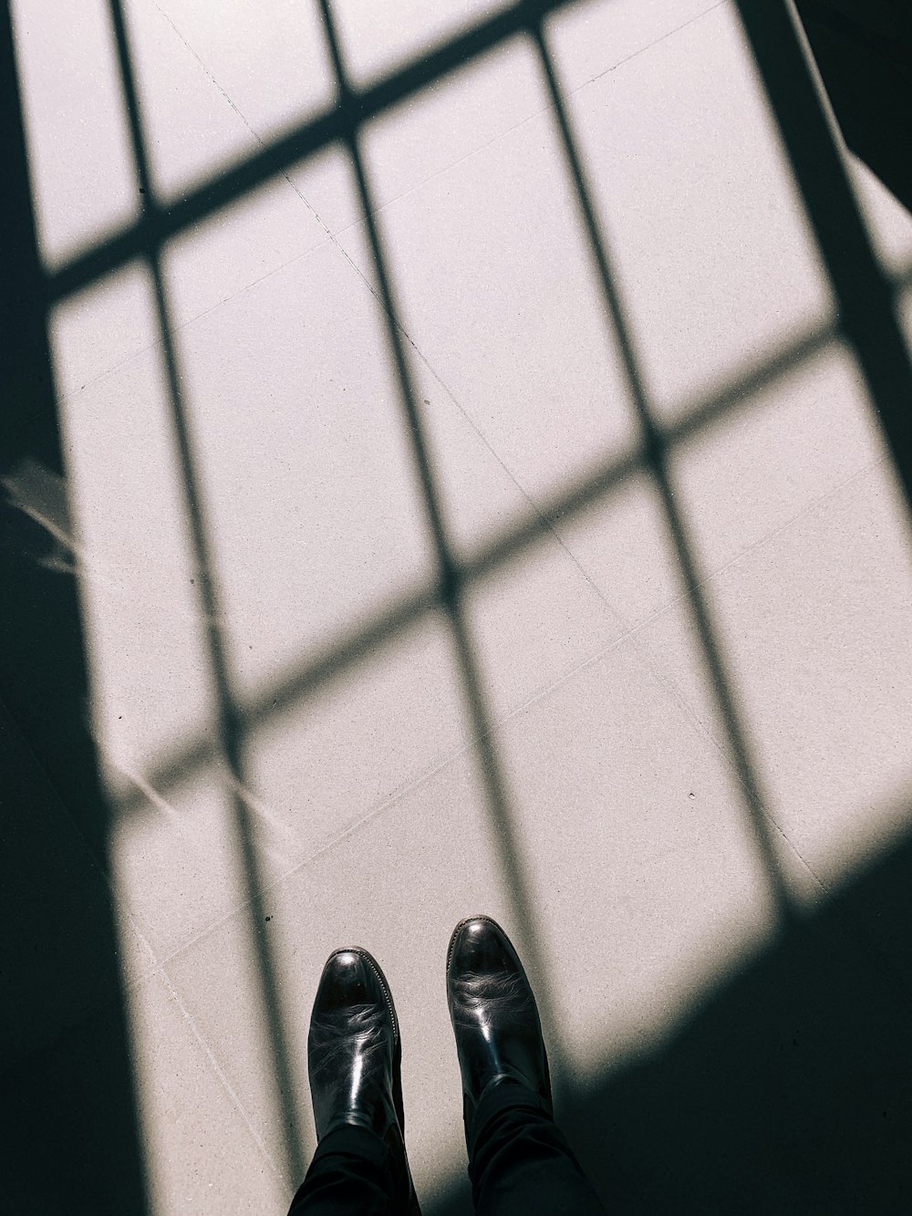 person standing on white surface at daytime