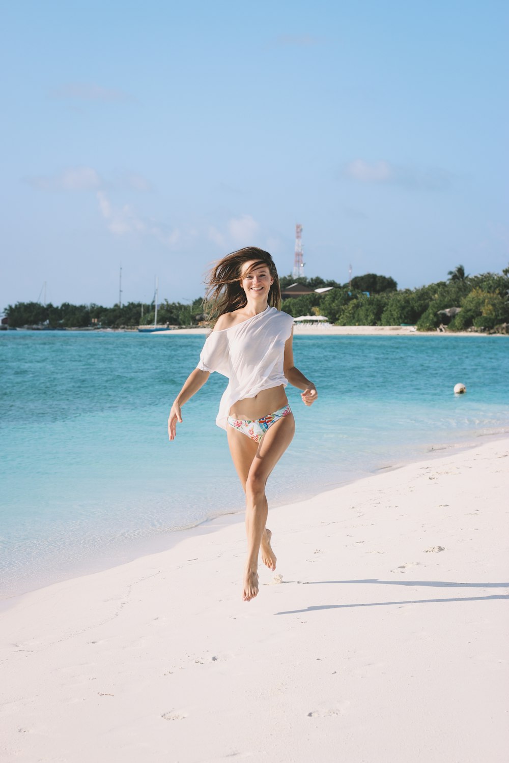 woman running on beach