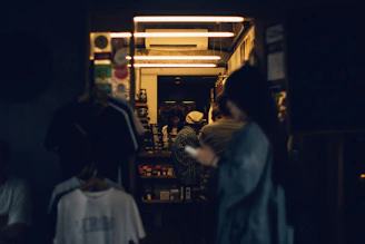 A warm, candid photo of the éclatlien founder sharing ideas with event vendors in a cozy, modern workspace.