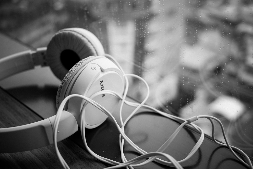 white corded Sony headphones