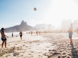 people playing beach volleyball