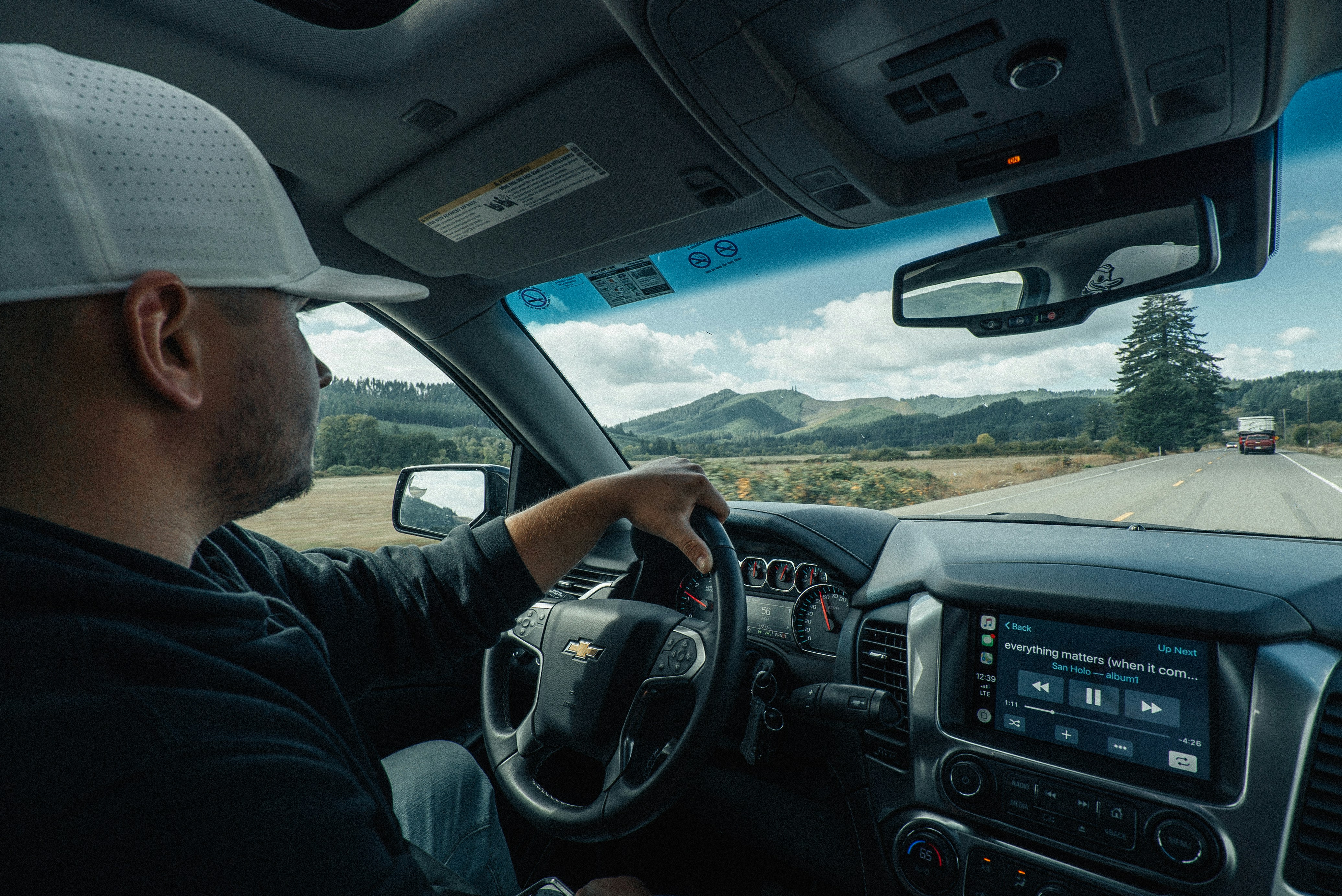 Man driving vehicle photo – Free Grey Image on Unsplash