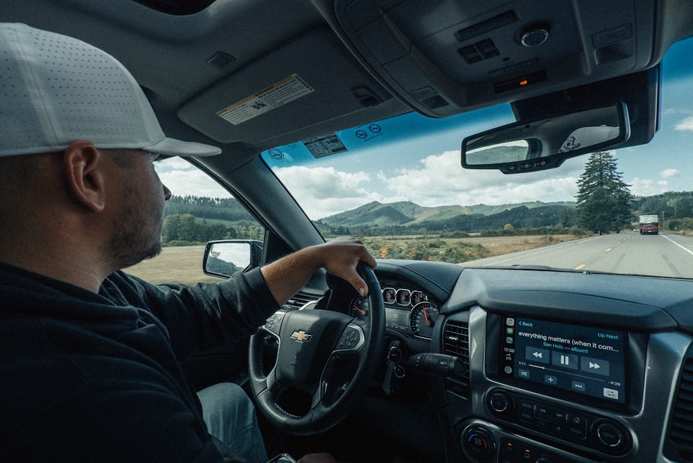 man driving vehicle