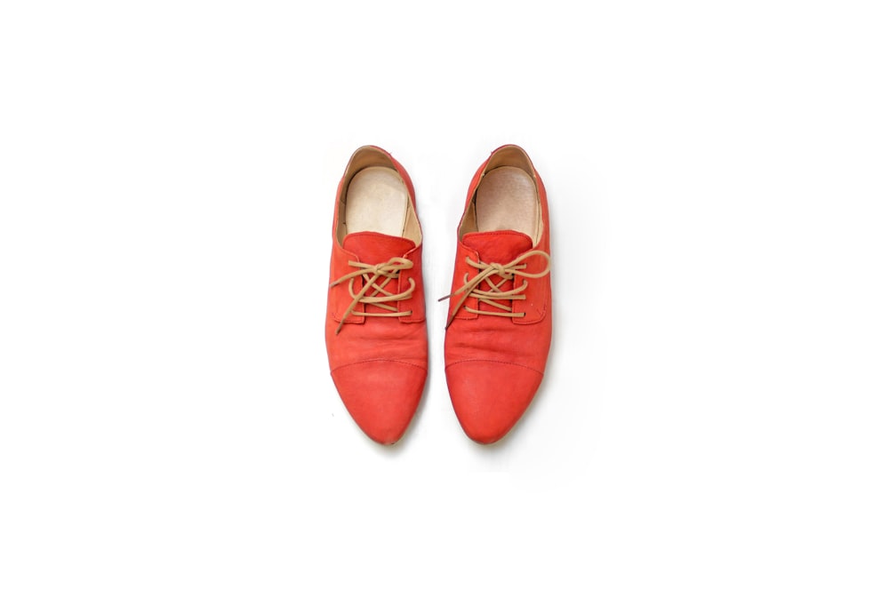 pair of red dress shoes