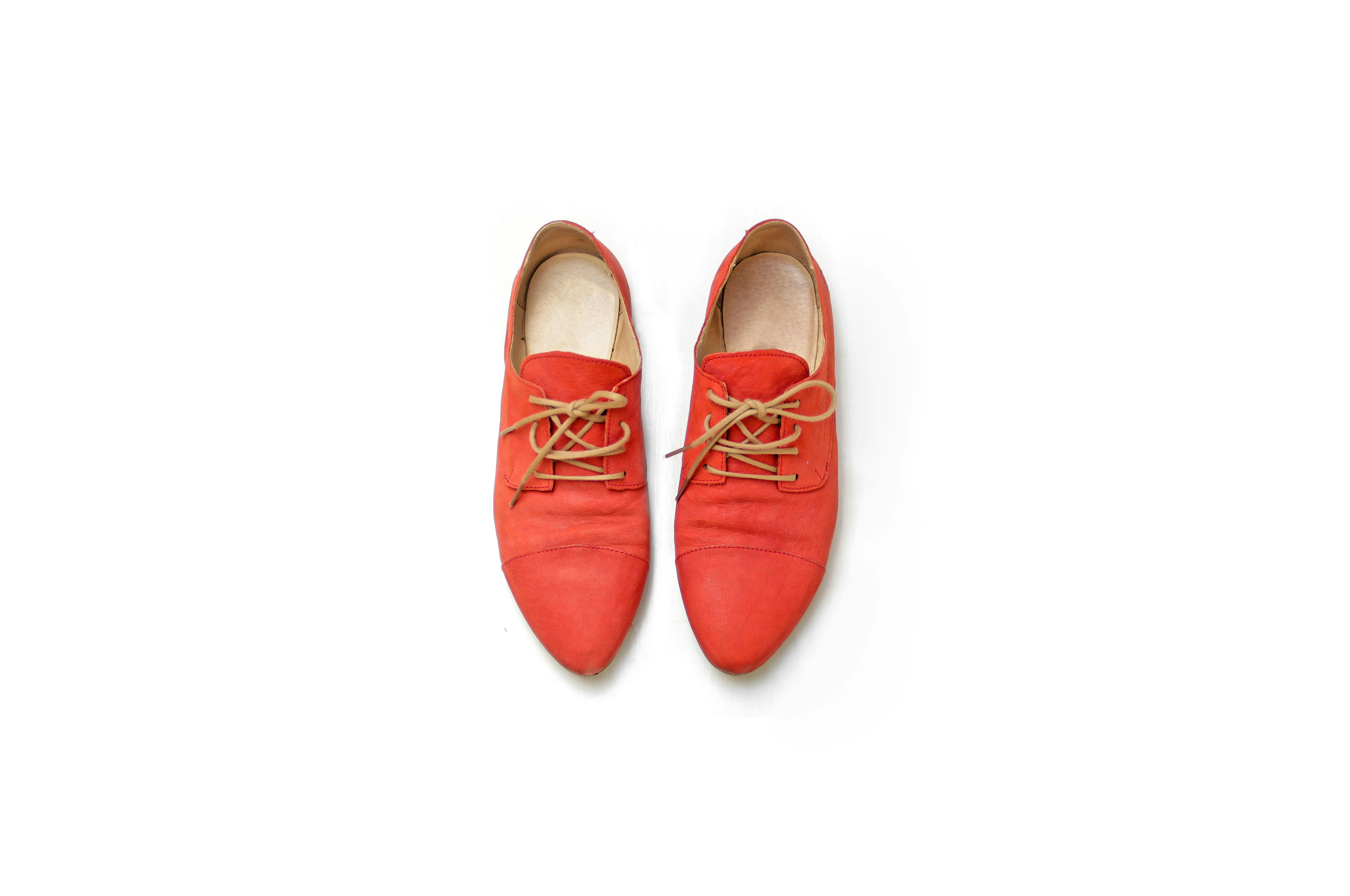 pair of red dress shoes