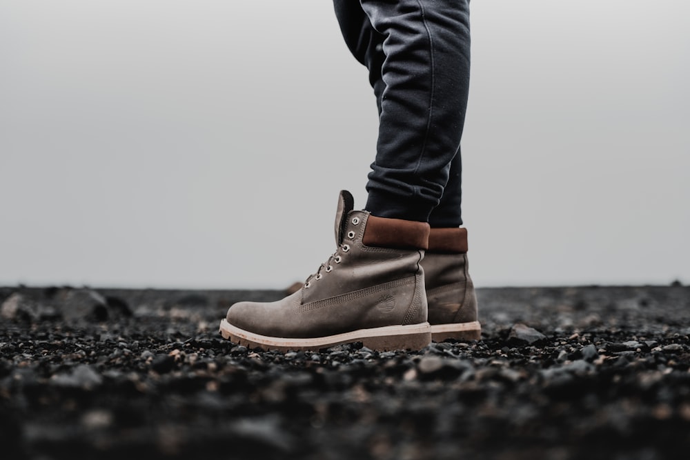 person standing on gravel