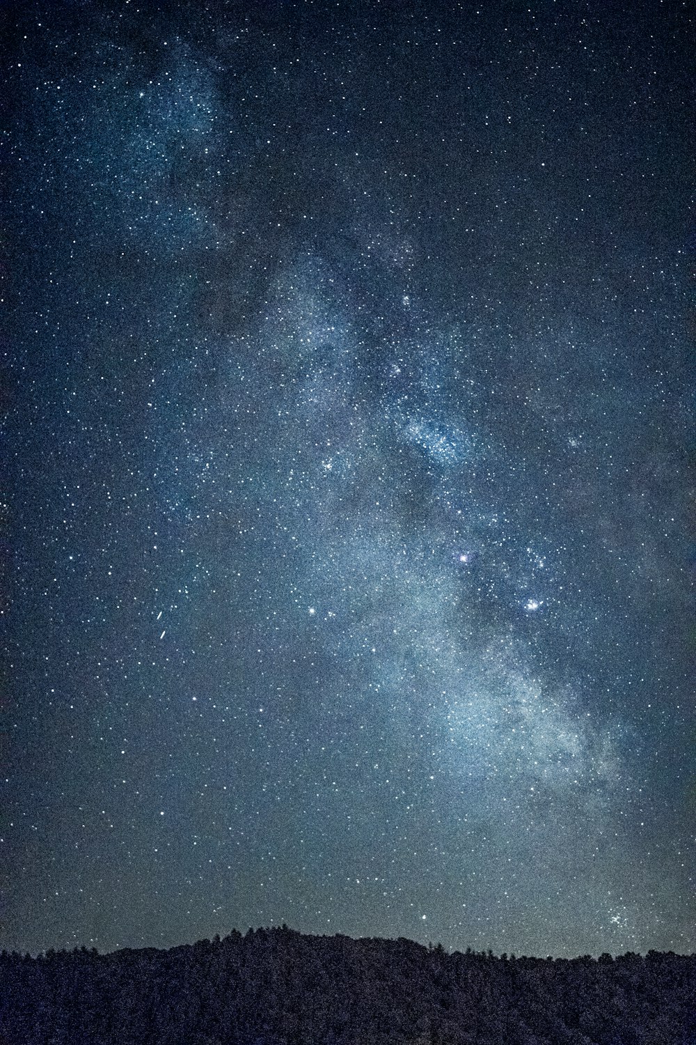 silhouette of mountain at nighttime