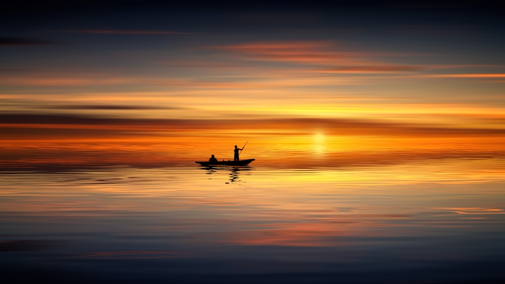 silhouette photo of person on boat