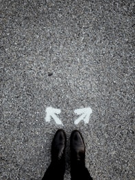 a person standing in the middle of a street