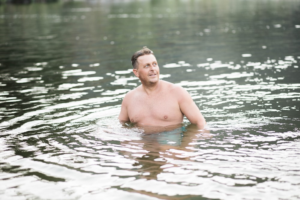 man swimming in river