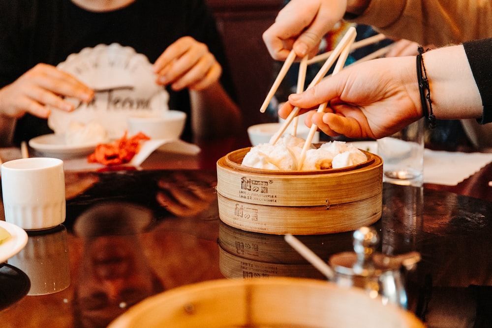 people eating dumplings