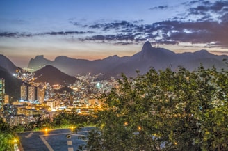 Night view of Rio de Janeiro’s Christ the Redeemer statue with subtle glowing lights.