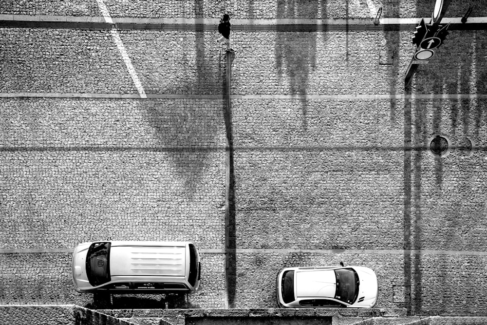 aerial photo of two cars