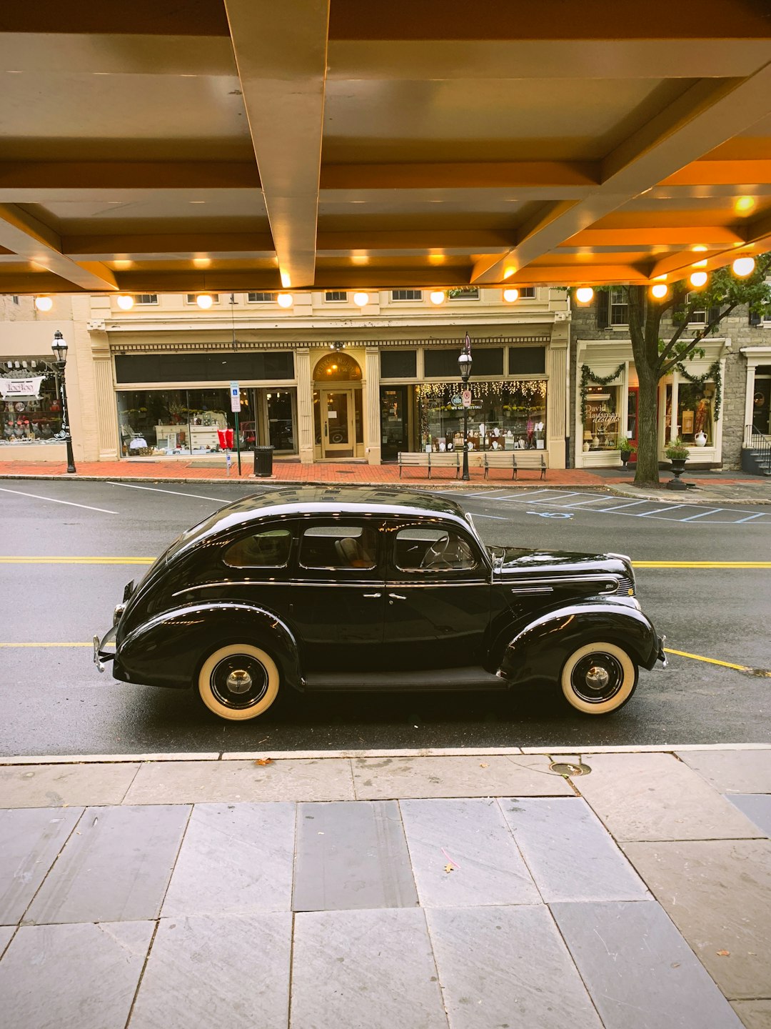 black vehicle on road at daytime