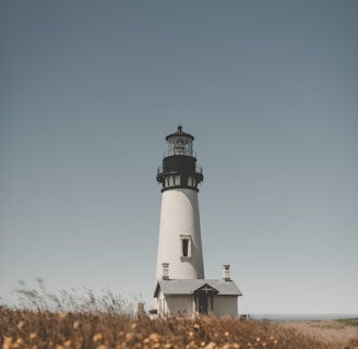 lighthouse under blue sky