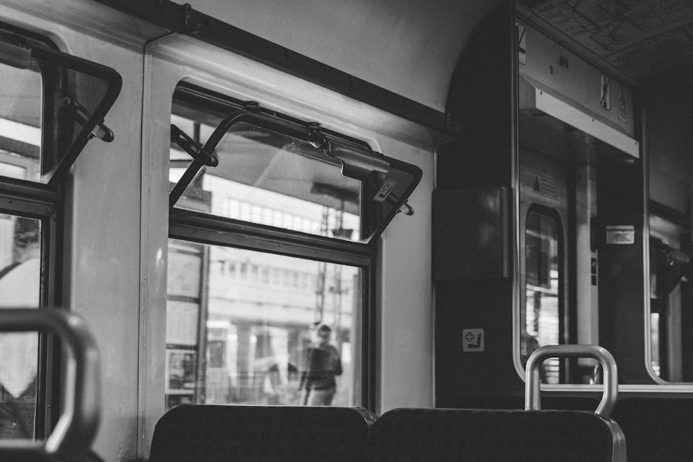 grayscale photo of vehicle window