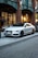 silver Audi sedan parked on street beside restore