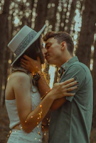 Illustration of a blooming enchanted forest where two lovers meet beneath twinkling fairy lights.