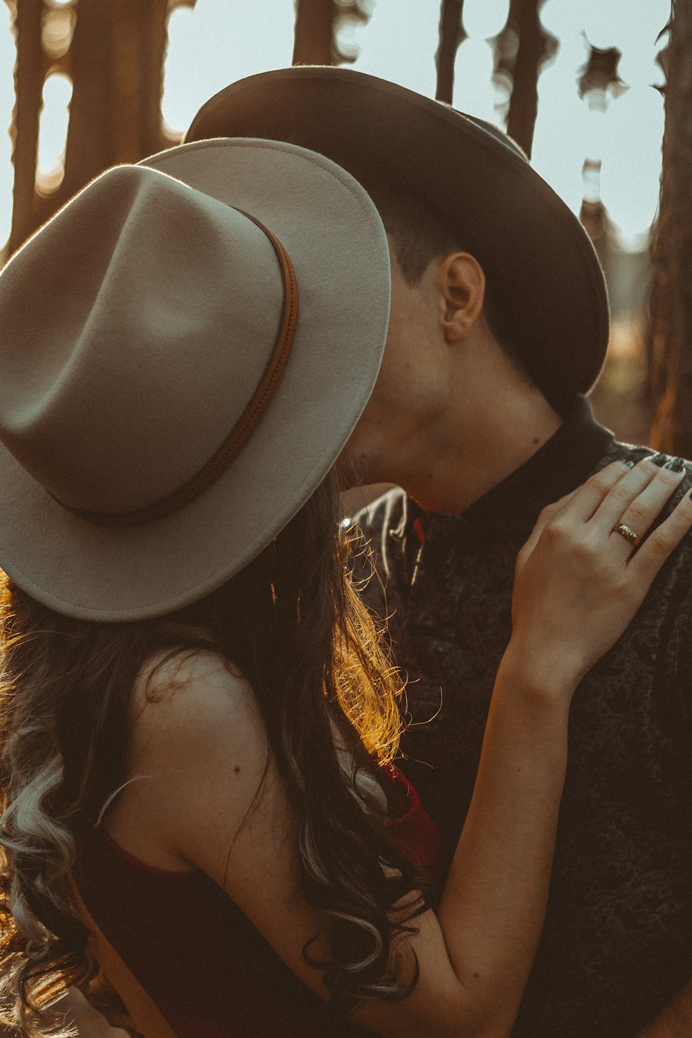 man and woman kissing