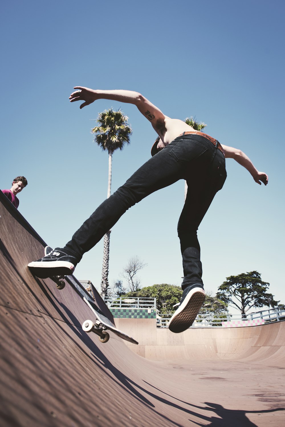 man making stun on skateboard