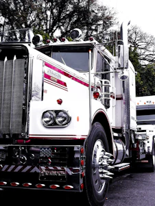 white freight truck during daytime