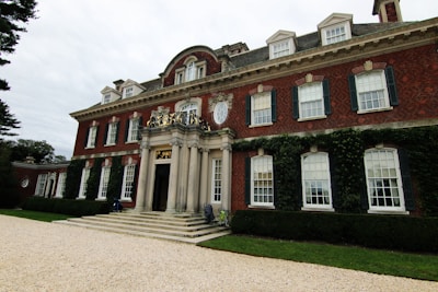 A stately old mansion with ivy climbing its stone walls, symbolizing the roots of Goderich Ventures.