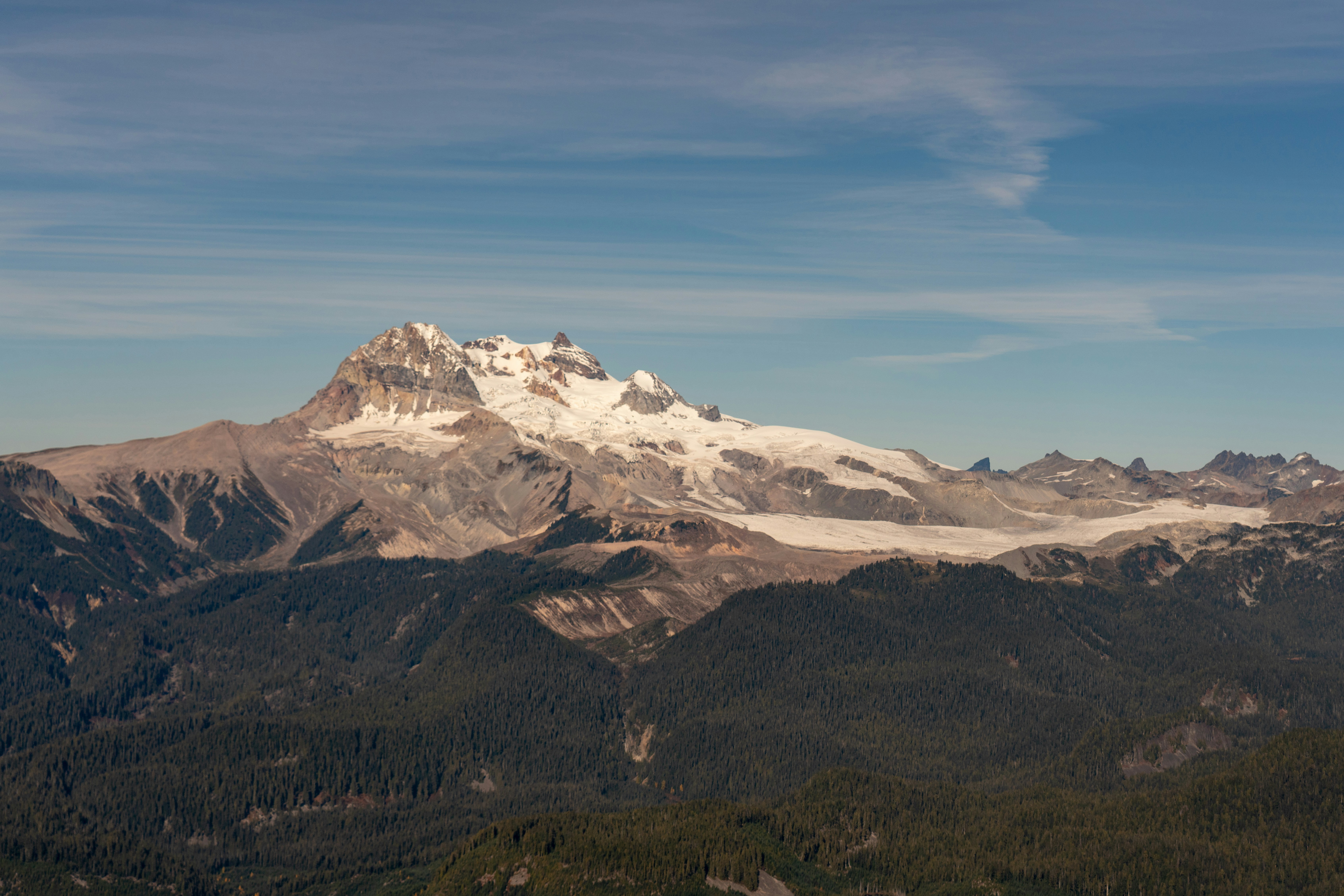 snow capped brown mountain during daytime