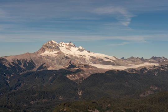 snow capped brown mountain during daytime in Mount Garibaldi Canada