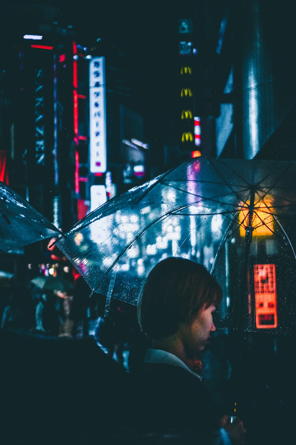 woman holding umbrella