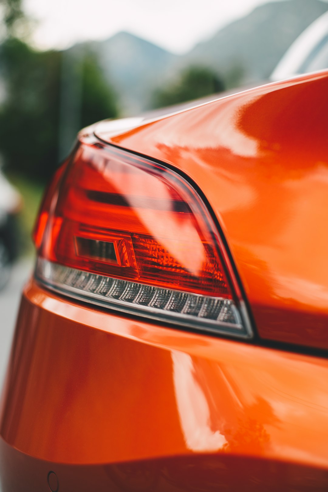 selective focus photography of vehicle taillight