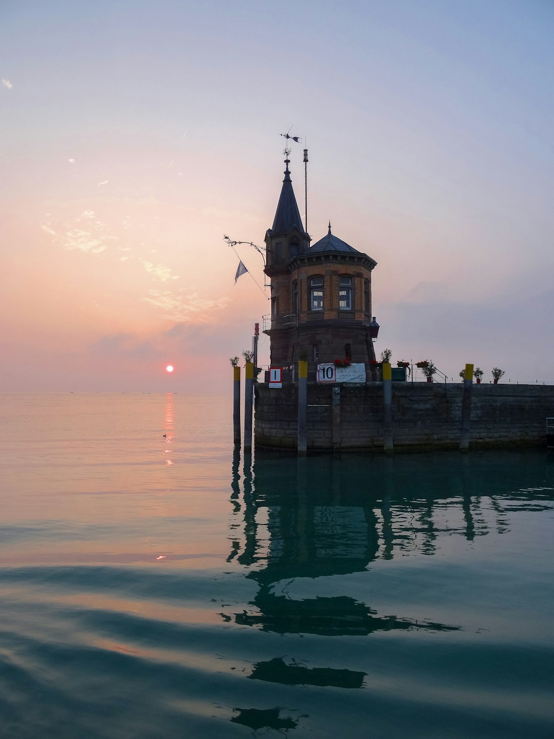 brown building by the sea