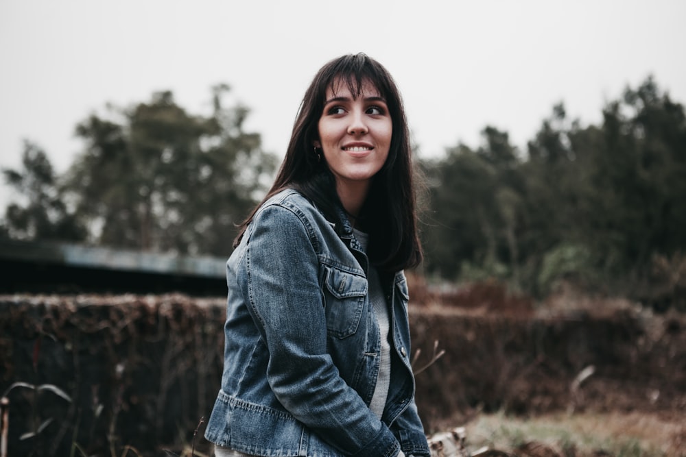 woman wearing blue chambray jacket