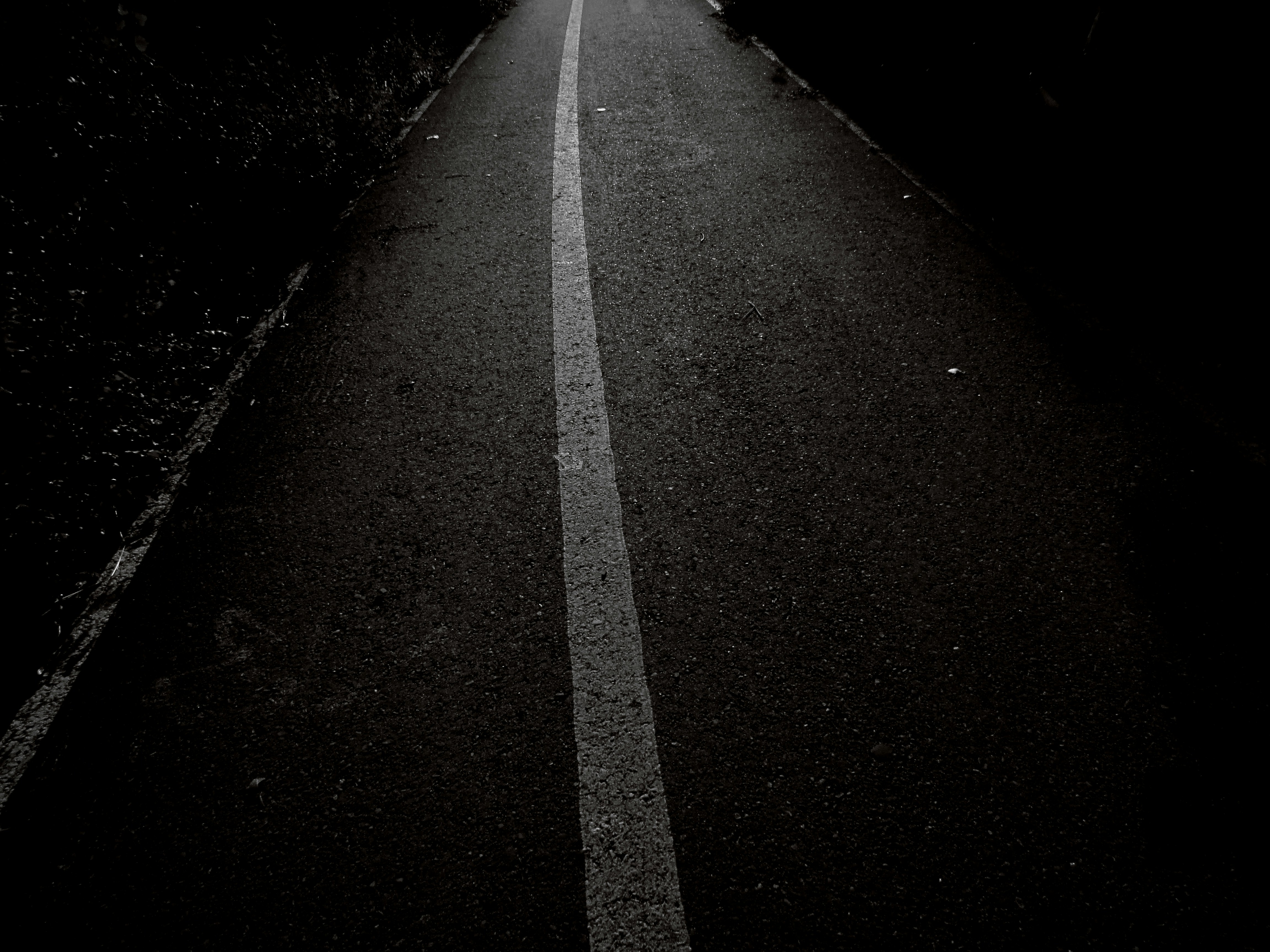 selective focus photography of gray concrete road during daytime