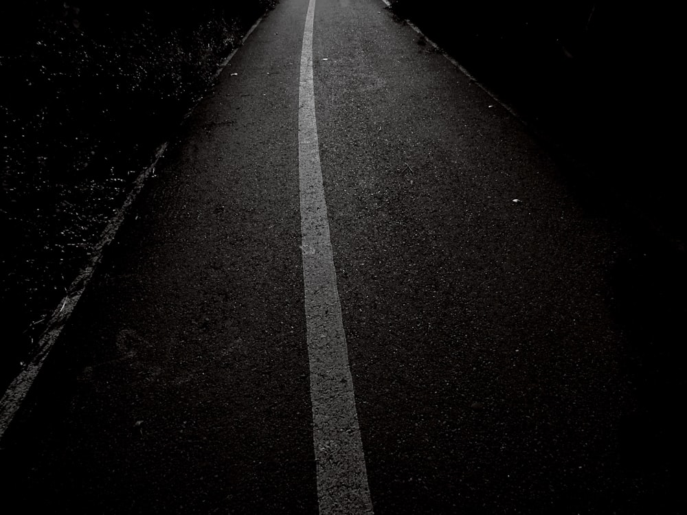 selective focus photography of gray concrete road during daytime