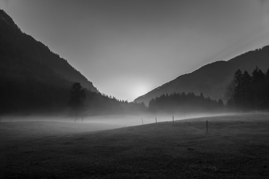 grayscale photography of mountain in Radovna Slovenia
