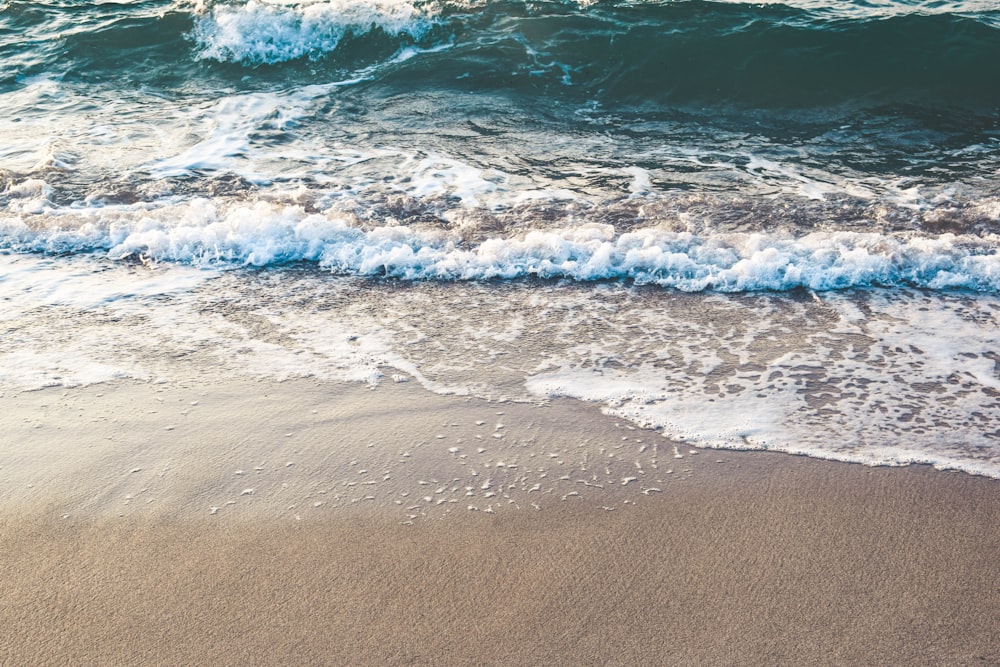 close-up photo of beach water on shore