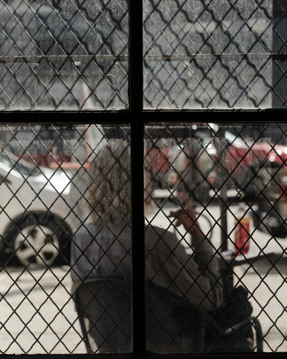 woman sitting near the window