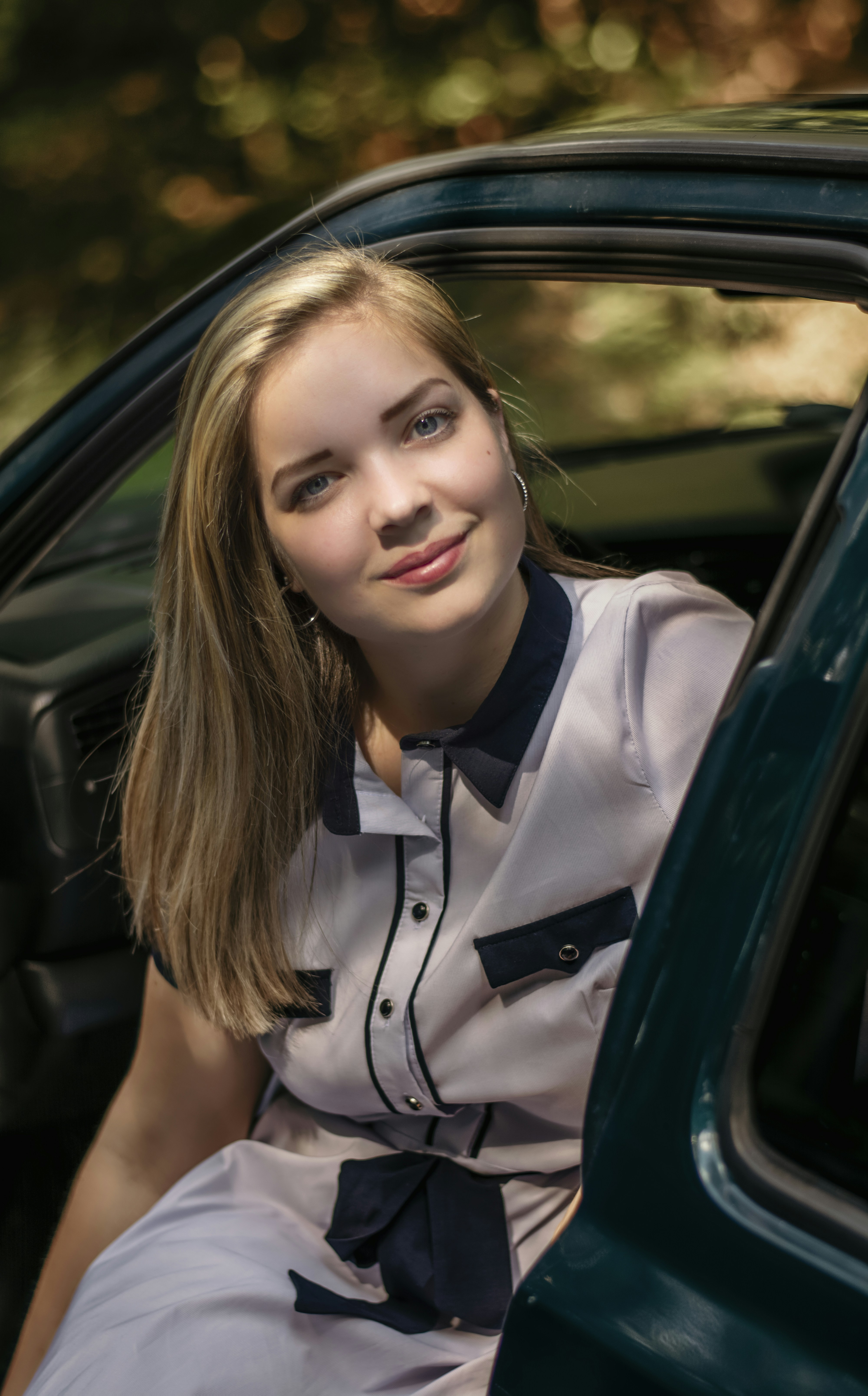 unknown celebrity riding on green car