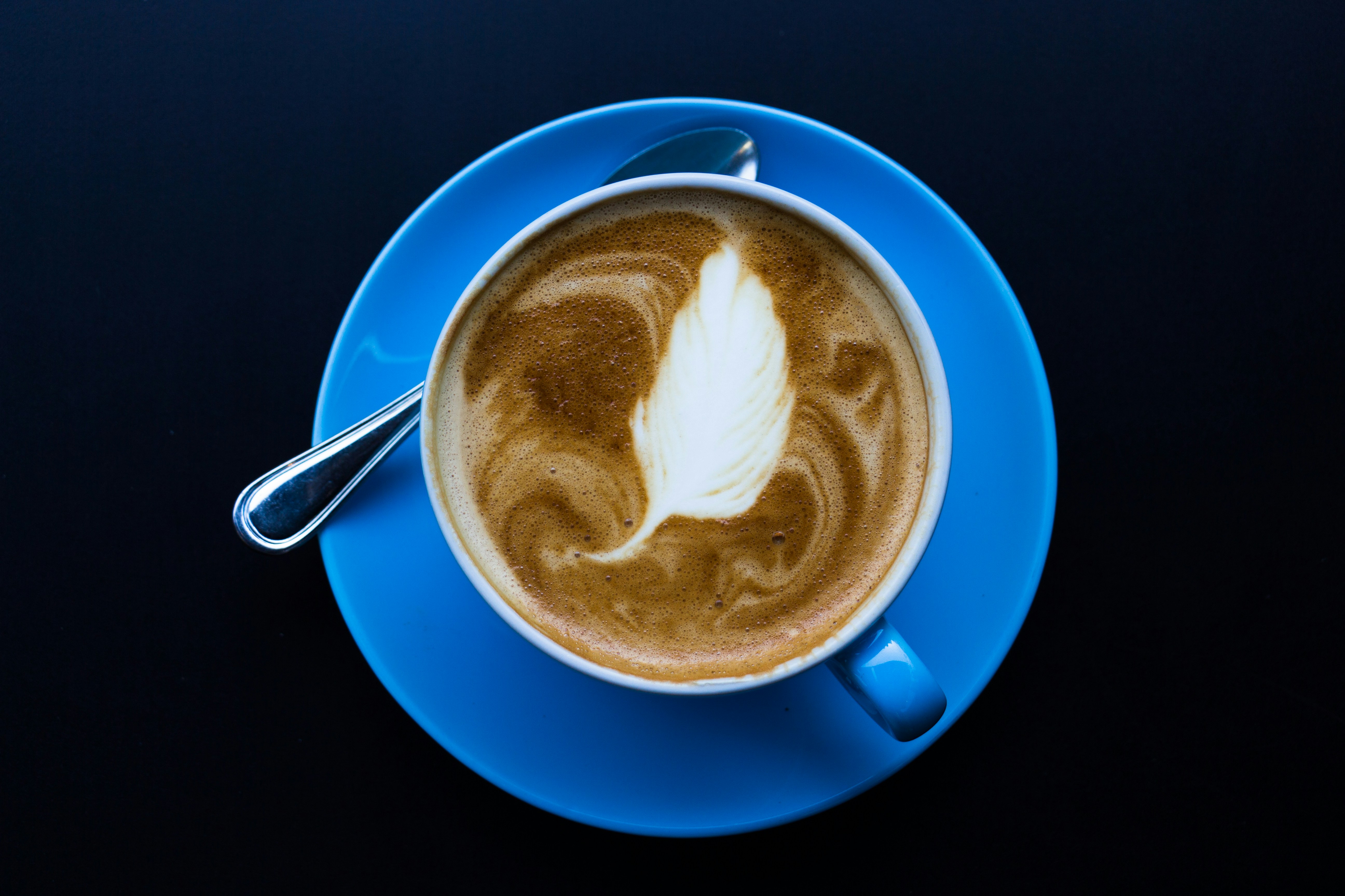 cup of tea on blue saucer