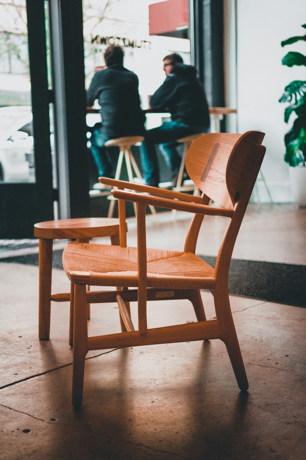 two empty wooden chairs