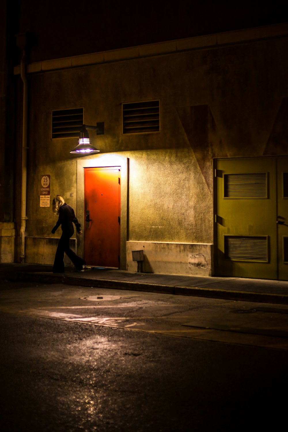 woman walking on hallway