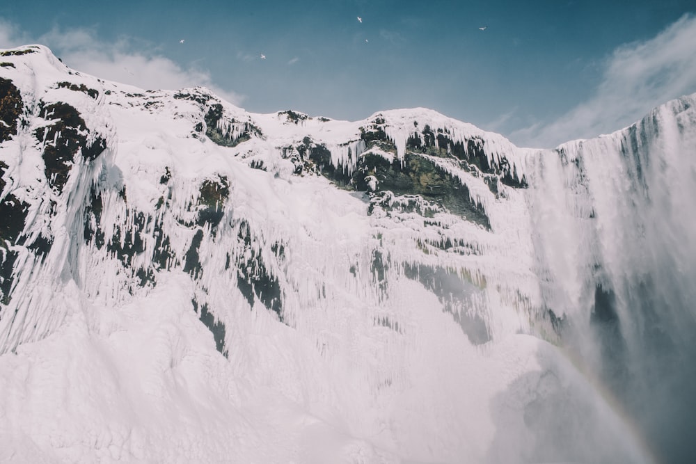 snow-covered mountain during daytime