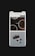 A smartphone screen displays an Instagram-like app interface showing a collection of images. The top image features two cups filled with coffee beans, while the lower image depicts a vintage Canon camera with a roll of film and lens cap beside it.